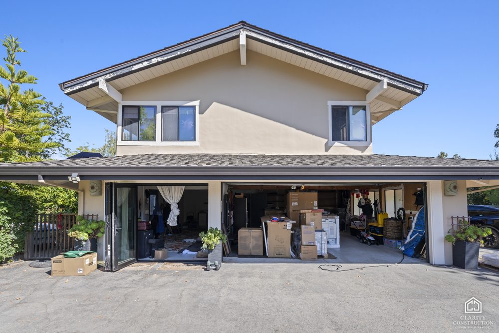 The house and garage from the driveway before the conversion
