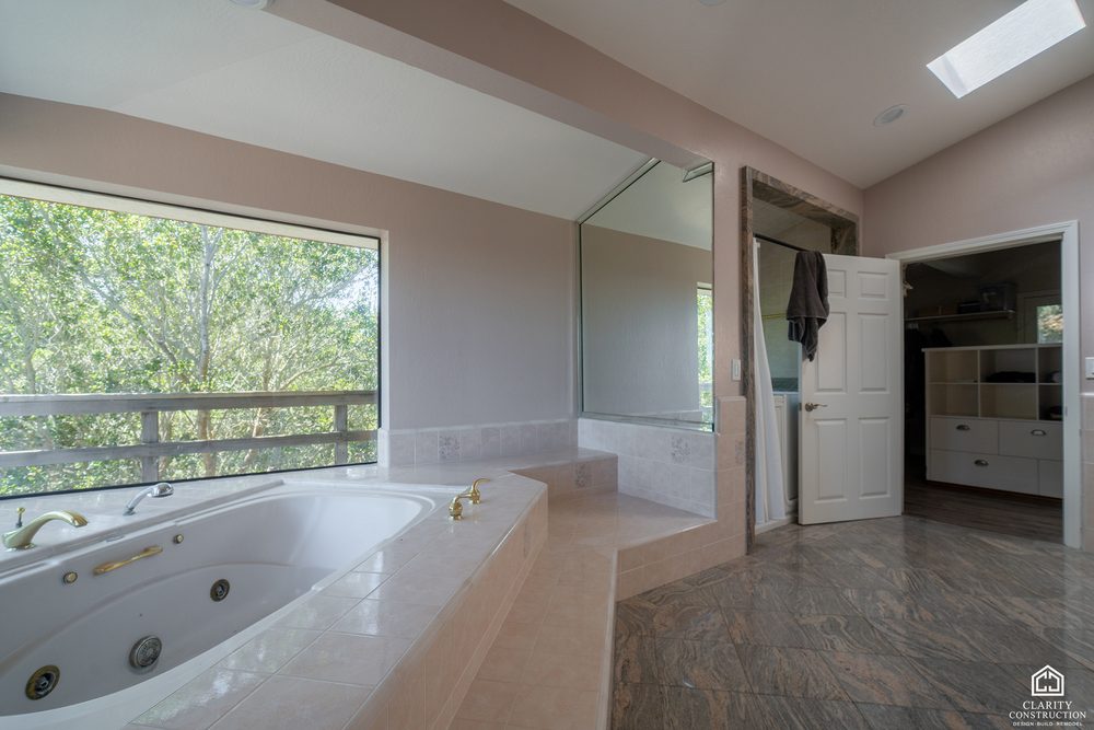 The original jetted tub in the corner before the remodel
