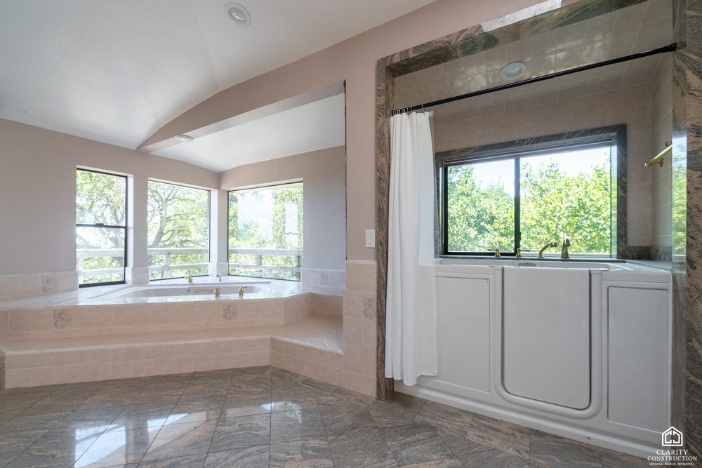 The original tub under the window before the remodel