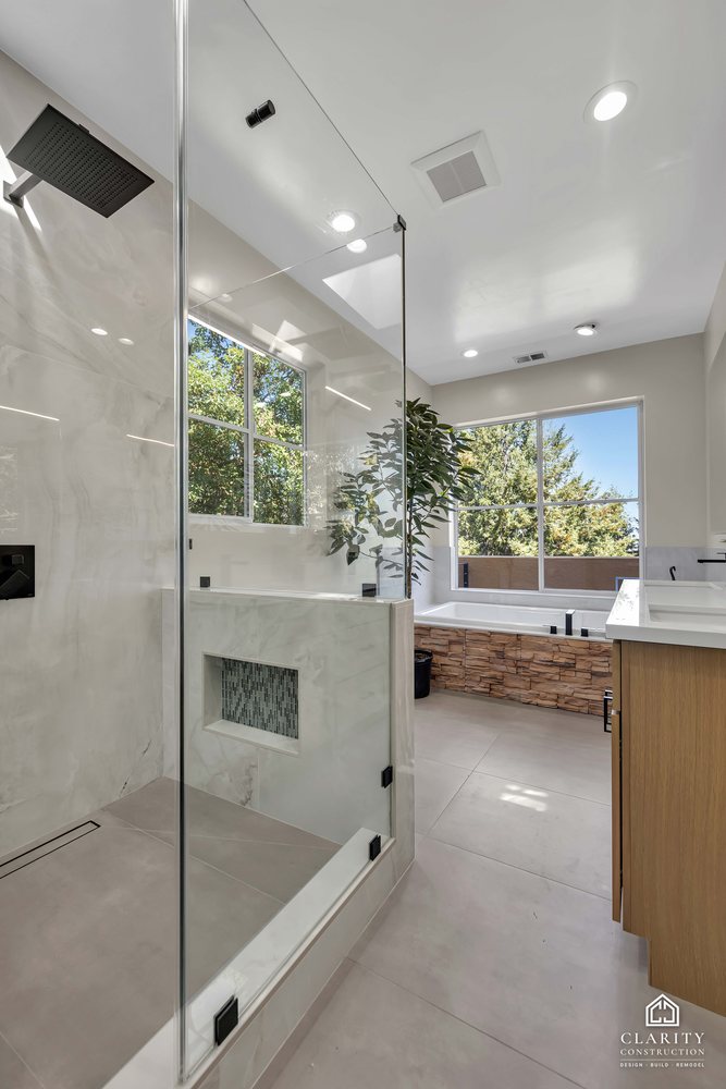 View through the shower glass to the tub