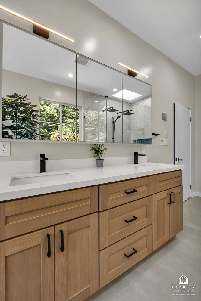 White oak double vanity with black hardware