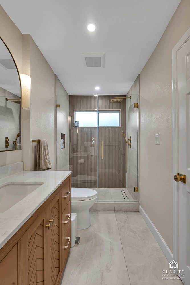 Hall bath: vanity and shower seen from the doorway
